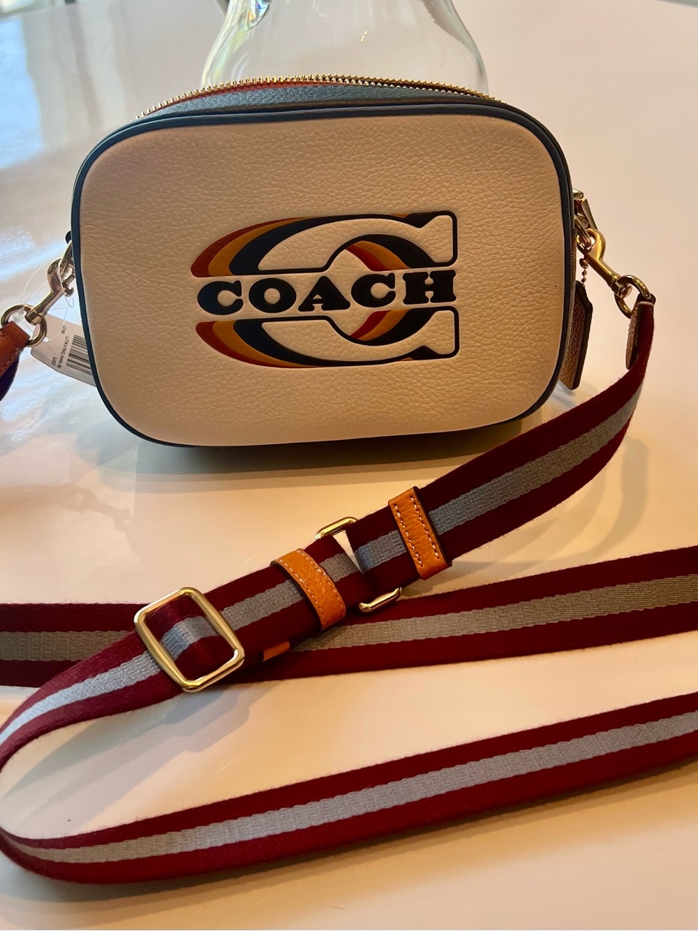 Coach Cream Leather Crossbody with Multicolor Logo and Striped Strap